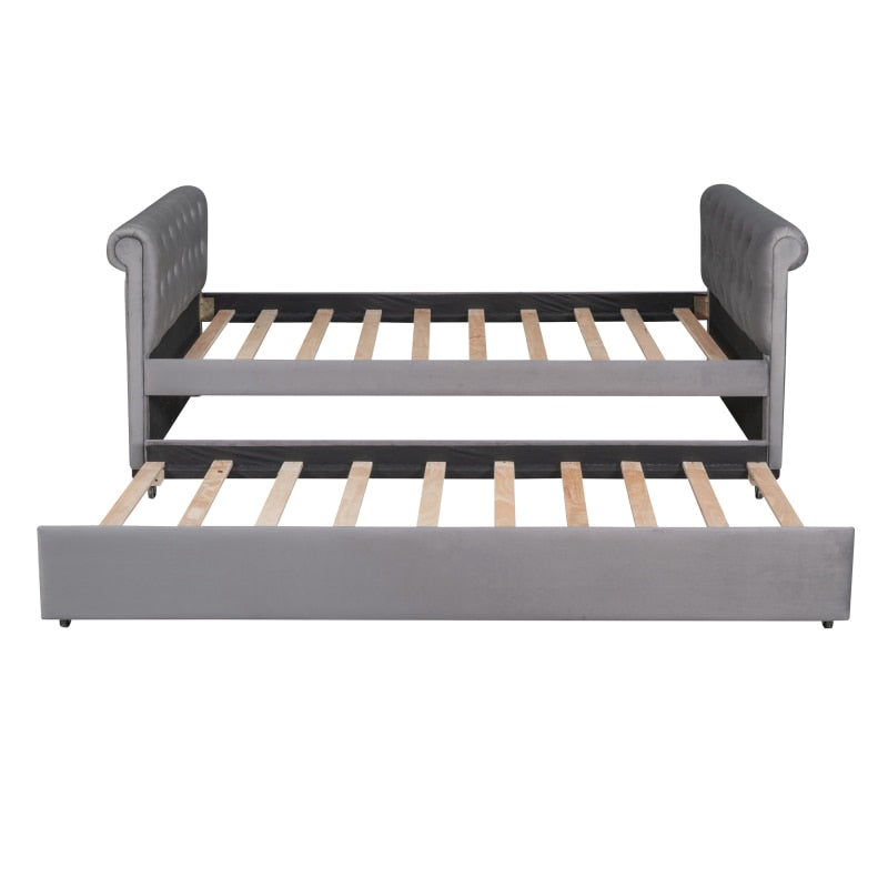 Grau gepolstertes Twin-Tagesbett + Rollbett